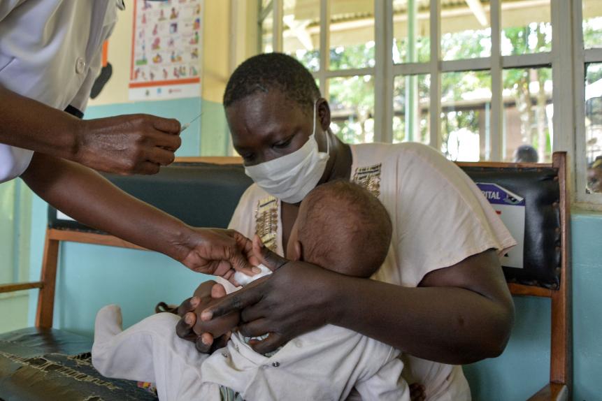 A child gets a malaria vaccination at Yala Sub-County hospital, in Yala, Kenya, on October 7, 2021. - World Health Organization (WHO) approved using the malaria vaccine, Mosquirix, on children between 5-month to 5-year old in sub-Saharan Africa and other parts with moderate to high malaria transmission after the malaria vaccine implementation programme (MVIP) in Ghana, Kenya, and Malawi since 2019. (Photo by Brian Ongoro / AFP) (Photo by BRIAN ONGORO/AFP via Getty Images)