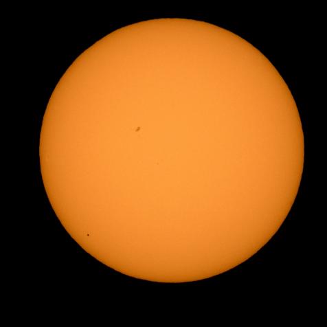 The planet Mercury is seen in silhouette, lower left, as it transits across the face of the sun Monday, May 9, 2016 Boyertown, Pennsylvania.  Mercury passes between Earth and the sun only about 13 times a century, with the previous transit taking place in 2006.  Photo Credit: (NASA/Bill Ingalls)
