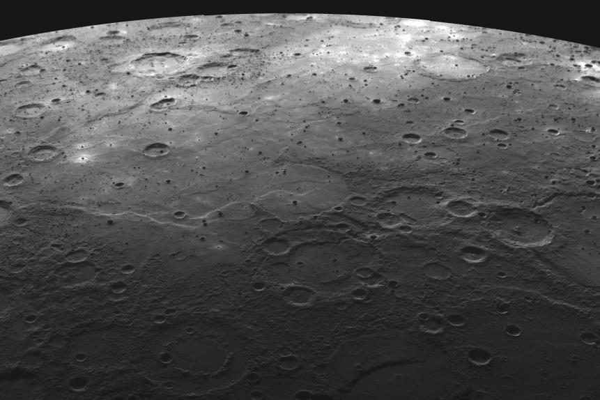 Why are many large craters on Mercury relatively smooth inside? Images from the MESSENGER spacecraft that flew by Mercury in October 2008 show previously uncharted regions of the planet that have large craters with an internal smoothness similar to Earth's own moon, and are thought to have been flooded by lava floes that are old but not as old as the surrounding more highly cratered surface.  MESSENGER will buzz past Mercury late in 2009 before entering orbit in 2011.