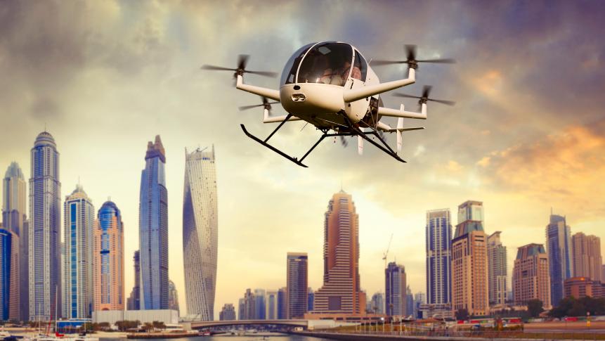 Flying futuristic drone transporting people in Dubai