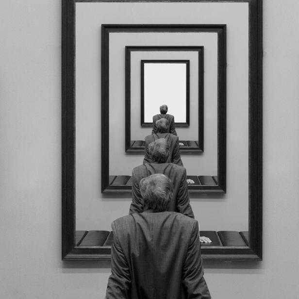 Man in art gallery looking at image of himself, composite image