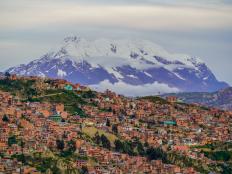 Cityscape of La Paz with Illimani Mountain rising in the background, Bolivia