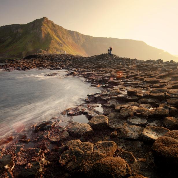 Setting sun over the The Giants Causeway, County Antrim, Northern Ireland.