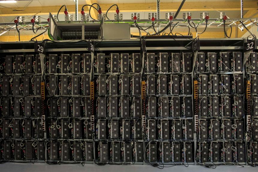 Mining rigs of a super computer are pictured inside the bitcoin factory 'Genesis Farming' near Reykjavik, on March 16, 2018. - At the heart of Iceland's breathtaking lava fields stands one of the world's largest bitcoin factories at a secret location rich in renewable energy which runs the computers creating the virtual currency. (Photo by Halldor KOLBEINS / AFP) (Photo by HALLDOR KOLBEINS/AFP via Getty Images)