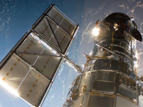 How Astronomers Use a Trick of Gravity to See the Most Distant Objects in the Universe