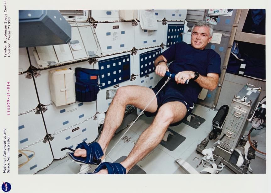 American NASA astronaut Michael R Clifford beside the shuttle's ergometer as he uses the rowing machine temporarily deployed in the mid-deck area of the Space Shuttle Endeavour during mission STS-59, 14th April 1994. The primary objective of STS-59 is to use the Space Radar Laboratory-1 (SRL-1), as part of NASA's Mission to Planet Earth program, to study the Earth's ecosystem. (Photo by Space Frontiers/Archive Photos/Hulton Archive/Getty Images)
