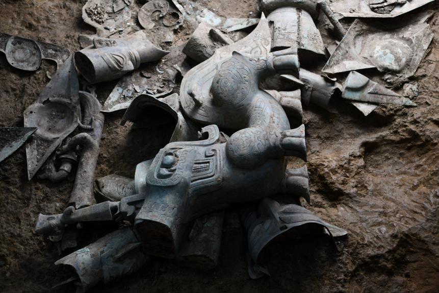 GUANGHAN, CHINA - AUGUST 08: Bronze statue relics are unearthed at No. 8 sacrificial pit of the Sanxingdui Ruins site on August 8, 2022 in Guanghan, Deyang City, Sichuan Province of China. (Photo by Zhang Lang/China News Service via Getty Images)