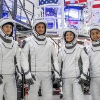 The four members of the SpaceX Crew-5 mission pose for a portrait in their Crew Dragon flight suits at SpaceX headquarters in Hawthorne, California. From left are, Mission Specialist Anna Kikina from Roscosmos; Pilot Josh Cassada and Commander Nicole Aunapu Mann, both from NASA; and Mission Specialist Koichi Wakata from the Japan Aerospace Exploration Agency (JAXA).