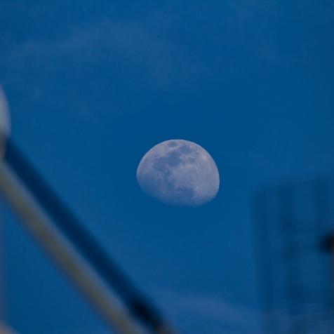 The bright Luna. Half moon during daylight in the blue sky as seen from Thessaloniki, Greece on April 16, 2019 (Photo by Nicolas Economou/NurPhoto via Getty Images)