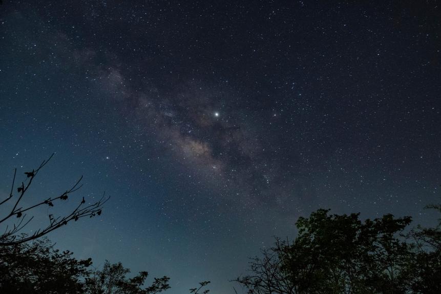 PUNE, INDIA - MAY 5: Grand display of the summer Milky Way, this is the best time of the year when one can see the beauty of our own galaxy in the night sky and the separation of the winter and Summer Milky Way. Seen in this photograph is the beautiful spiral arm of our galaxy; stars of the constellation Libra, constellation Scorpius, Planet Jupiter (Bright Spot at the Center) & Majestic Saturn at 8 o'clock of Jupiter. This photo was taken at Varasgaon during an overnight Star Gazing programme organized by Aastronomica Club, on May 5, 2019 in Pune, India. (Photo by Pratham Gokhale/Hindustan Times via Getty Images)