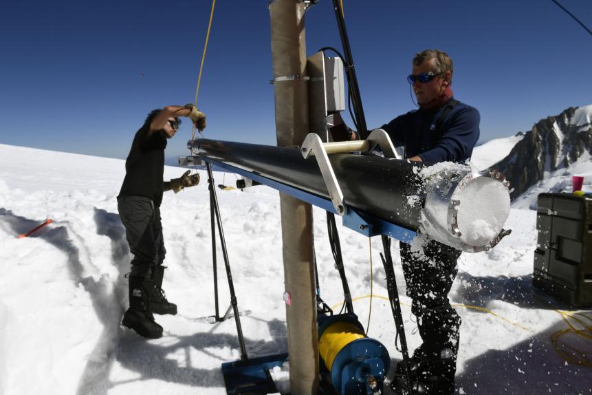 Members of the "Ice Memory project" extract an ice core piece out of a drill machine, on August 25, 2016, in their camp at the "Col du Dome" glacier (4304 m) as part of the "Ice Memory project" near the Mont-Blanc peak in Chamonix, eastern France.
Two ice cores of more than 120 meters were extracted before being preserved in Antarctica as part of an operation to save the "memory" of ice, threatened by global warming. / AFP / PHILIPPE DESMAZES        (Photo credit should read PHILIPPE DESMAZES/AFP via Getty Images)
