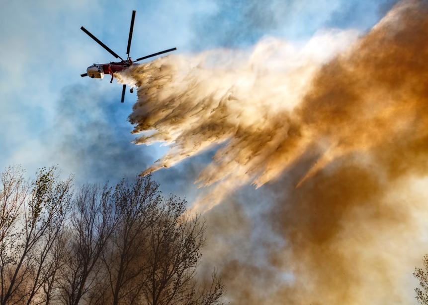 Helitanker Dropping Water on a Wildfire
